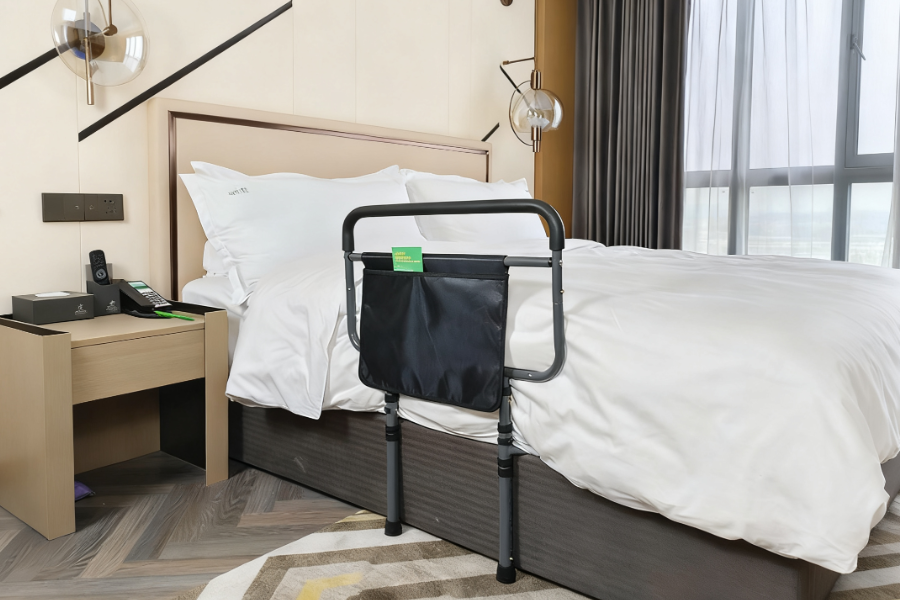 bed assist grab bar with storage pocket